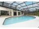 Large screened-in pool with access from multiple rooms at 1633 Cedar Glen Dr, Apopka, FL 32712