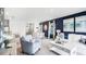 Open living space with white couch and adjacent dining and kitchen areas at 1705 Frogmore Ave, Haines City, FL 33844