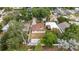 Aerial view of the property showing backyard, storage, fencing, and surrounding landscape at 2002 Geigel Ave, Orlando, FL 32806