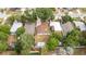 Aerial view of the house showcasing the lot size, surrounding trees, and neighborhood layout at 2002 Geigel Ave, Orlando, FL 32806