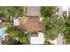 Aerial view of the property showing the layout of the backyard and surrounding landscape at 2002 Geigel Ave, Orlando, FL 32806
