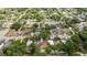 An aerial view of a residential neighborhood with lush green trees and well maintained homes at 2002 Geigel Ave, Orlando, FL 32806