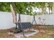 Backyard shaded swing set with overhead umbrella for relaxing outdoors at 2002 Geigel Ave, Orlando, FL 32806