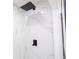 Bathroom with rain shower head, white marble and dark fixture at 2002 Geigel Ave, Orlando, FL 32806
