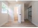 Bathroom entryway with view of the vanity, toilet, and tiled shower at 2002 Geigel Ave, Orlando, FL 32806