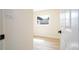 Bright bedroom with wood floors and a fresh coat of paint at 2002 Geigel Ave, Orlando, FL 32806