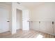 Bright bedroom with wood floors, built-in cabinets and two entrances at 2002 Geigel Ave, Orlando, FL 32806