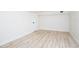 Bright bedroom offers neutral walls and vinyl plank floors creating a blank canvas to make your own at 2002 Geigel Ave, Orlando, FL 32806
