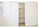 Bedroom closet with sliding door offering plenty of space for clothing and shelving for storage at 2002 Geigel Ave, Orlando, FL 32806