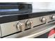 Stainless steel electric range with glass top and easy to grip dials offer a modern aesthetic at 2002 Geigel Ave, Orlando, FL 32806