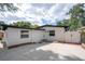 Inviting home with modern accents, fresh exterior paint, and a spacious private driveway at 2002 Geigel Ave, Orlando, FL 32806