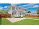 Charming home boasts a spacious backyard with a brick patio and privacy fence at 219 Laurel Ave, Sanford, FL 32771