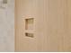 Modern shower showcasing sleek wood-look tile and built-in storage niches at 219 Laurel Ave, Sanford, FL 32771