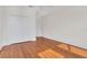 Charming bedroom with hardwood floors and ample closet space at 219 Laurel Ave, Sanford, FL 32771