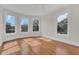Spacious bedroom with hardwood floors and large windows at 219 Laurel Ave, Sanford, FL 32771