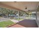 Spacious front porch with white columns, overlooking a tree-lined street at 219 Laurel Ave, Sanford, FL 32771