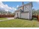 Two-story house with gray siding and backyard at 219 Laurel Ave, Sanford, FL 32771