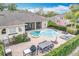 Aerial view of the backyard, which includes a pool, outdoor dining area, and lounge seating at 278 Eaglet Way, Lake Mary, FL 32746