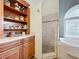 Spa-like bathroom with walk-in shower, soaking tub and built-in shelving at 278 Eaglet Way, Lake Mary, FL 32746