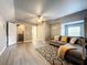 Comfortable bonus room with couch and built-in shelving at 278 Eaglet Way, Lake Mary, FL 32746