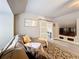 Bright bonus room with L-shaped sofa and sliding barn door at 278 Eaglet Way, Lake Mary, FL 32746
