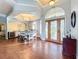 Elegant dining room with hardwood floors and a chandelier at 278 Eaglet Way, Lake Mary, FL 32746