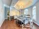 Elegant dining room with hardwood floors and a tray ceiling at 278 Eaglet Way, Lake Mary, FL 32746