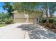 Well-maintained home with a three-car garage, mature trees, and a meticulously kept lawn and landscape at 278 Eaglet Way, Lake Mary, FL 32746