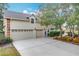 Beautiful home with a spacious three-car garage, well-maintained lawn, and mature landscaping at 278 Eaglet Way, Lake Mary, FL 32746