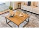 Stylishly decorated living room featuring a modern coffee table, textured rug, and a comfortable sofa at 278 Eaglet Way, Lake Mary, FL 32746