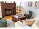 A living room showcasing a fireplace and comfortable seating, creating an inviting atmosphere at 278 Eaglet Way, Lake Mary, FL 32746