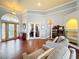 Spacious living room with hardwood floors and comfy seating at 278 Eaglet Way, Lake Mary, FL 32746