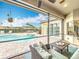 Enjoy the beautiful view from this screened lanai, complete with comfortable seating at 278 Eaglet Way, Lake Mary, FL 32746