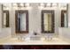 Double vanity bathroom with mirrors at 2901 S Atlantic Ave # 702, Daytona Beach, FL 32118