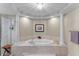 Spa-like bathroom with large tub at 2901 S Atlantic Ave # 702, Daytona Beach, FL 32118