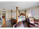 Bedroom with large four poster bed at 2901 S Atlantic Ave # 702, Daytona Beach, FL 32118