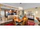 Bright dining area with wooden table and chairs, near kitchen at 2901 S Atlantic Ave # 702, Daytona Beach, FL 32118