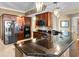 Modern kitchen with granite countertops and stainless steel appliances at 2901 S Atlantic Ave # 702, Daytona Beach, FL 32118