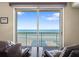 Living room with ocean view and comfortable seating at 2901 S Atlantic Ave # 702, Daytona Beach, FL 32118