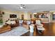 Open living space featuring a sectional sofa and hardwood floors at 2901 S Atlantic Ave # 702, Daytona Beach, FL 32118