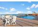 Enjoy the resort-style amenities with a relaxing pool and seating area at 2901 S Atlantic Ave # 702, Daytona Beach, FL 32118