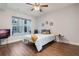 Spacious bedroom with a queen-size bed and a large window at 300 E South St # 3015, Orlando, FL 32801