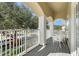 Private balcony with white chairs and neighborhood view at 346 Calliope St, Ocoee, FL 34761