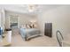 Serene bedroom with a cozy bed and Parisian decor at 346 Calliope St, Ocoee, FL 34761