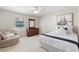 Comfortable bedroom with a dresser and nautical artwork at 346 Calliope St, Ocoee, FL 34761