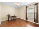 Well lit bedroom with hardwood floors and a desk at 346 Calliope St, Ocoee, FL 34761