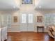 Bright entryway with hardwood floors and double doors with glass at 346 Calliope St, Ocoee, FL 34761