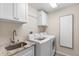 Convenient laundry room with front-load washer and dryer at 346 Calliope St, Ocoee, FL 34761