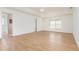 Expansive main bedroom with a ceiling fan, and light hardwood flooring at 36502 Barrington Dr, Eustis, FL 32736