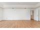 Spacious main bedroom with a ceiling fan, and light hardwood flooring at 36502 Barrington Dr, Eustis, FL 32736